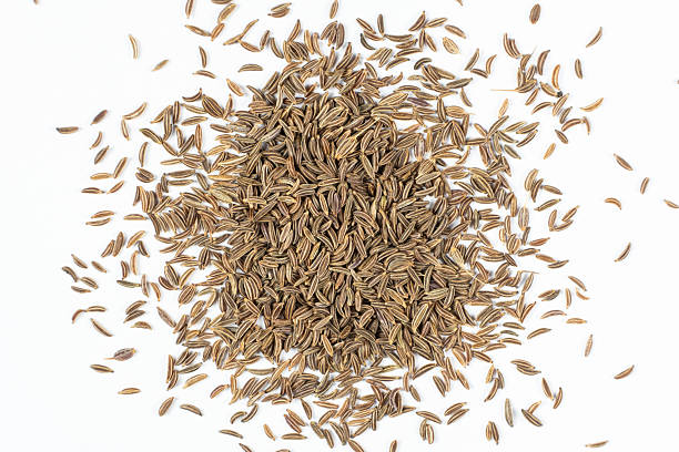 istock Dried Cumin Seeds Close-Up Culinary Ingredient on White Top View 2208472842