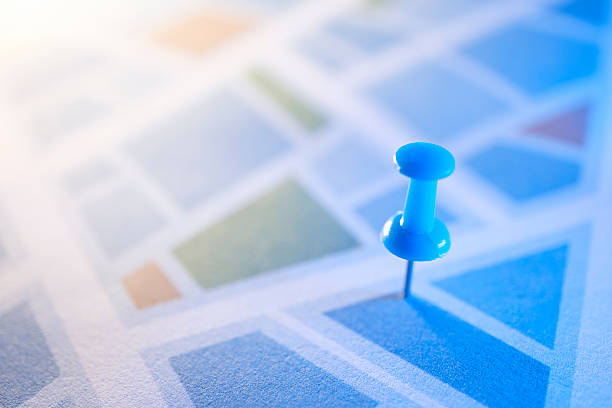 A digitally generated image featuring a thumbtack placed on a road map, symbolizing travel planning, navigation, and destination marking. This clear and purposeful design represents exploration, trip organization, and journey mapping, making it ideal for vacation visuals, travel blogs, and route-focused content.