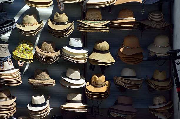 istock Souvenir stall selling sun hats in Nerja, Malaga. 2208473650