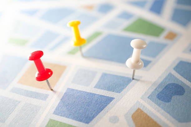 Thumbtacks on Road Map, Travel and Navigation Concept stock photo