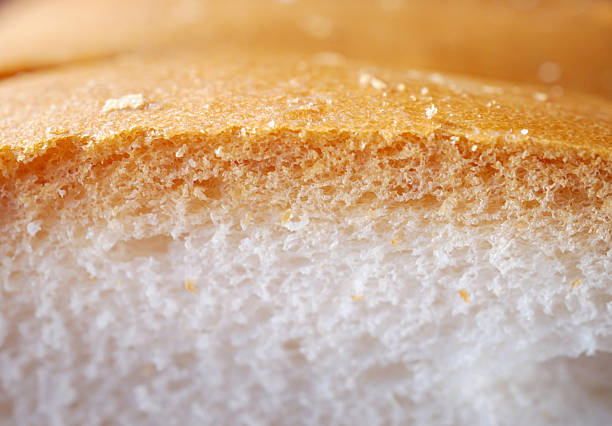 Fresh, soft and fragrant bread with brown edges macro food