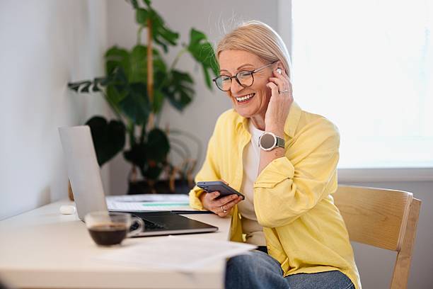 istock Businesswoman receiving a voice message while working 2208476428