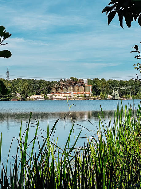 istock Lake with a building in the background 2208479035