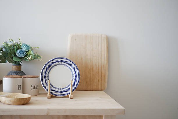 istock Minimalist Table Display with Blue Striped Plate and Wooden Elements 2208482672