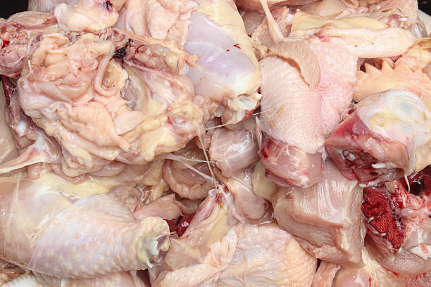 istock Close up of fresh raw chicken meat that has been cut into pieces 2208484777