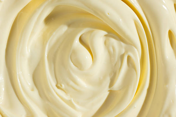 istock Abstract Food Background. Swirled Mayonnaise Spread 2208488658