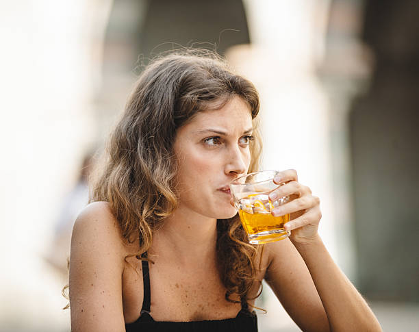nice girls drink cocktail at the cafe