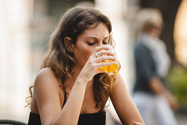 istock nice girls drink cocktail at the cafe 2208488801