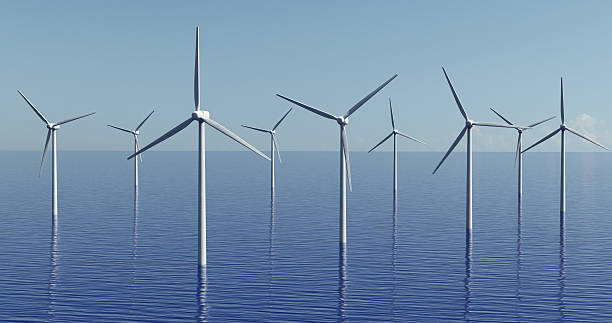 istock Wind power plant, wind generators on water, wind park 2208490277