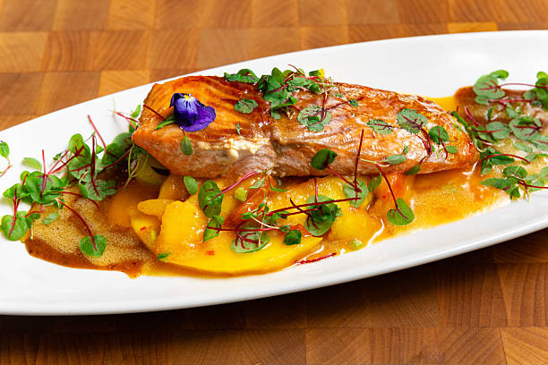 istock Gourmet salmon fillet with mango sauce. 2208491528