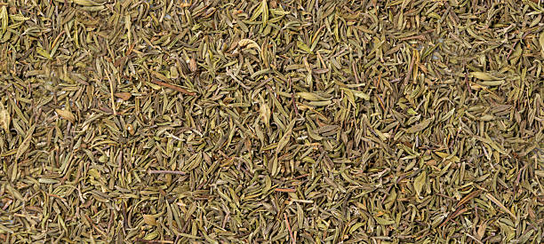 istock Dry thyme texture, dried marjoram pattern, oregano pile background, ground crushed thyme seasoning mockup 2208492073