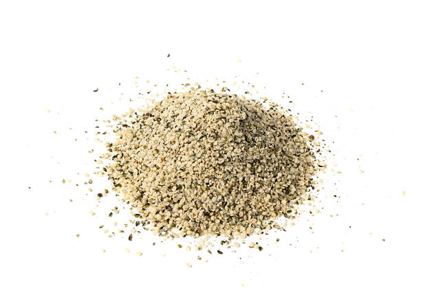 istock Shelled hemp seeds pile isolated, peeled cannabis grains, marijuana kernels without peel 2208492426