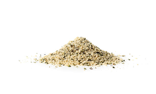 istock Shelled hemp seeds pile isolated, peeled cannabis grains, marijuana kernels without peel 2208492430
