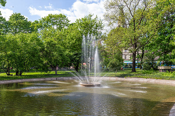 istock fountain in beautiful Planty park in Krakow 2208493657
