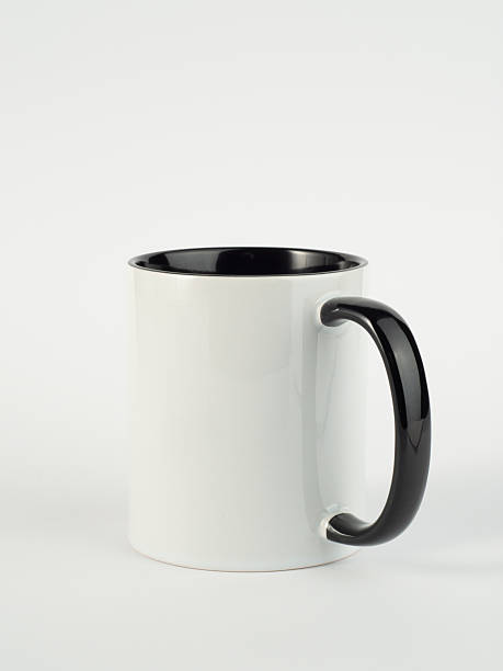 istock Two-tone 11oz mug on isolated background. Mug with black handle and inner part. 2208495837