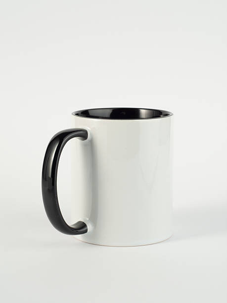 istock Two-tone 11oz mug on isolated background. Mug with black handle and inner part. 2208495845