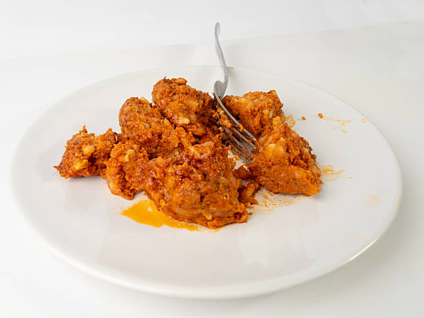 istock Paprika stew, Szczecin paprikash, traditional Polish fish spread with rice, tomato paste, vegetables on white 2208497132