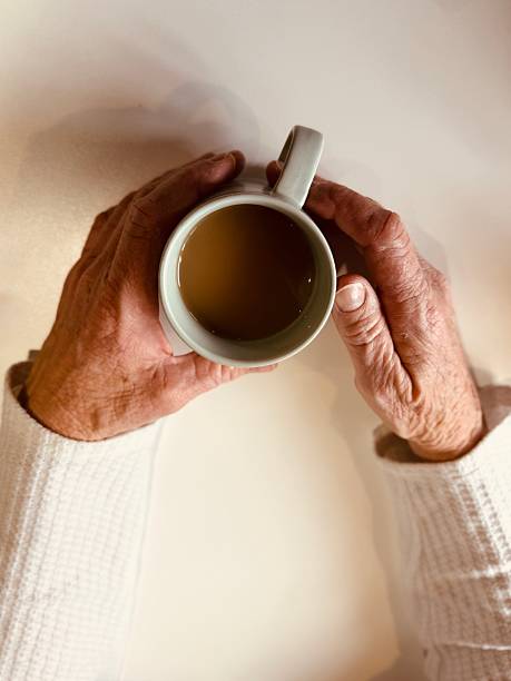 istock Hands holding a hot cup of coffee 2208498613