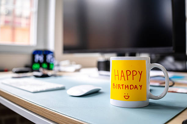Colorful sticky notes and a cheerful mug create an organized workspace filled with creativity and reminders
