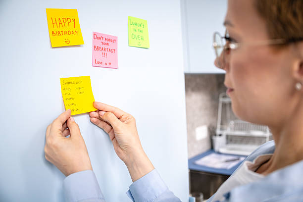 istock Creative use of colorful adhesive notes for reminders and ideas in a modern office setting 2208503825