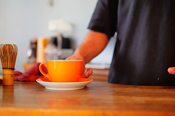 elderly having a cup of coffee after lunch