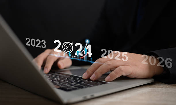 istock Concept startup project businessman touching or pressing on tablet with icon business and network connection on modern virtual interface from digital tablet to show growth goals occur in the future. 2208504319