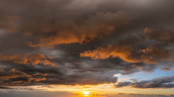 istock Evening sunset sky with colorful clouds. Panoramic skyscape 2208507733