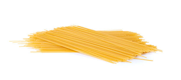 istock Raw spaghetti isolated, dry spagetti, long wheat noodles, uncooked italian macaroni bundle 2208509064