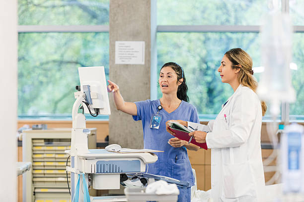 istock Two Female Doctors Using Computer in Medical Clinic 2208510160