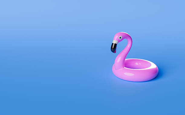 istock Inflatable flamingo on blue background 2208511283