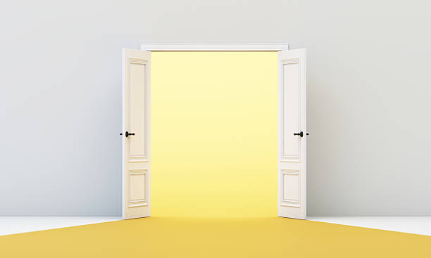 istock Symmetrical double doors opening to radiant yellow space, representing balance, openness, and embracing new possibilities. 3d rendering. 2208511291