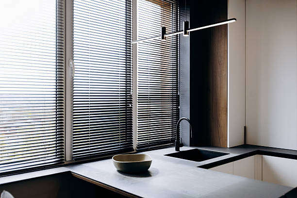 Experience a Modern Minimalist Kitchen that Embraces Natural Light and Features a Sleek Design