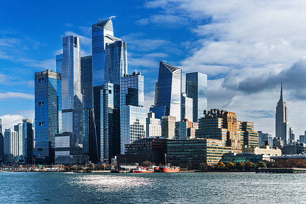 Hudson Yards Skyline With Waterfront and Clouds in Manhattan, New York