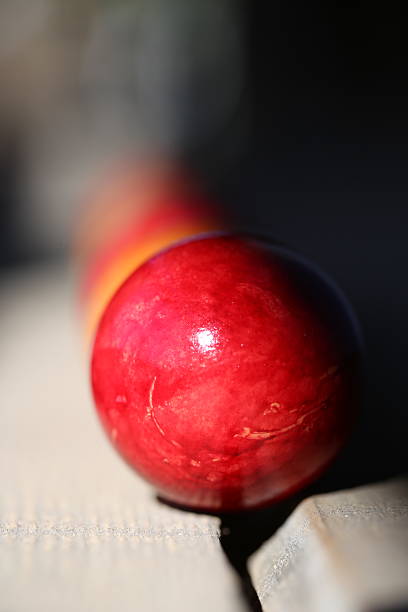 istock Easter eggs look like spheres. There are lying on the wooden floor. 2208517311