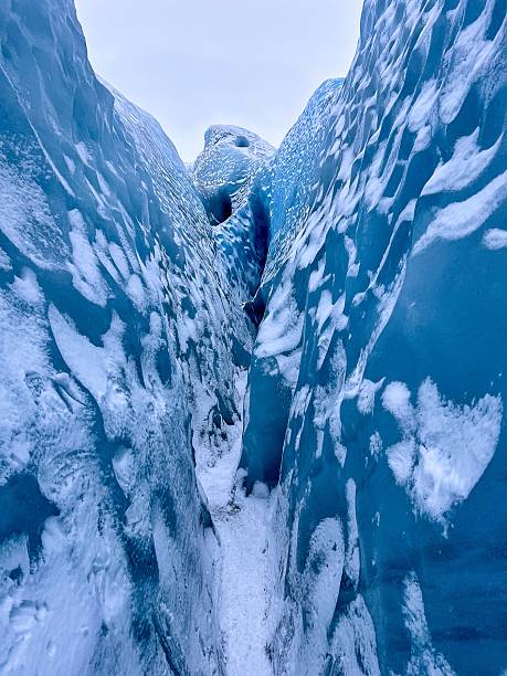 istock Icy Crevasse with Striking Blue Hues 2208517339