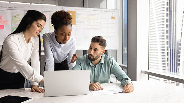 istock Serious young African manager presenting business plan, project strategy 2208520341