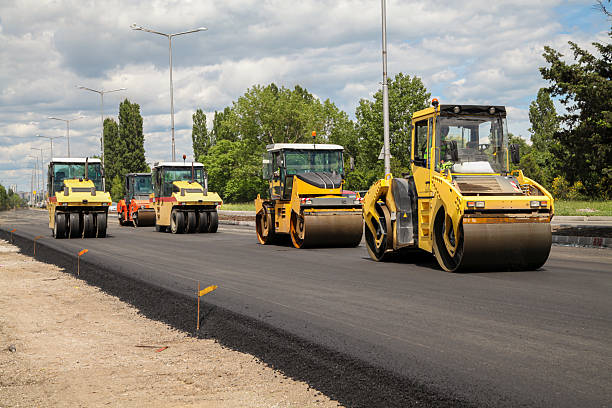 istock Group of heavy vibration roller compactors. Asphalting. Road construction 2208527037