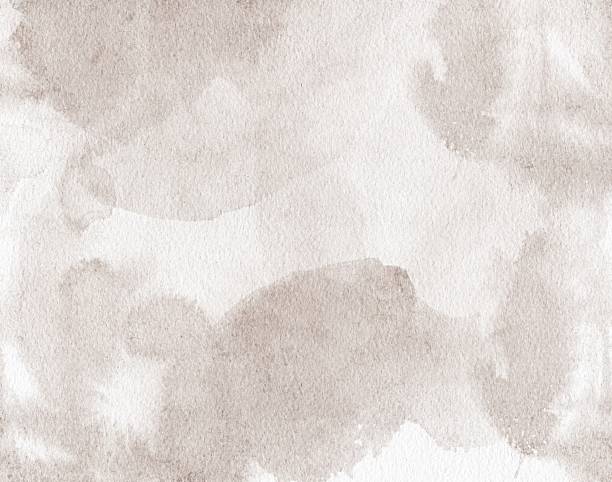 istock Soft watercolor texture in warm beige and sepia tones, resembling aged paper. Hand painted artistic background with gradients and organic flow. Ideal for vintage designs, and creative projects 2208527637