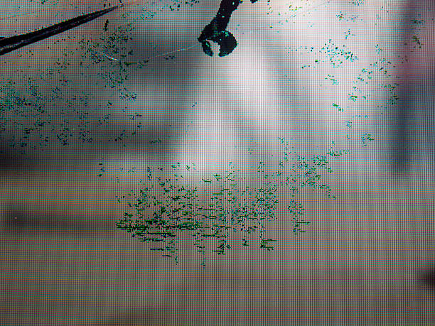 istock Close-up of broken LCD LED screen showing pixel distortion and texture, creating a digital drama effect. 2208531554