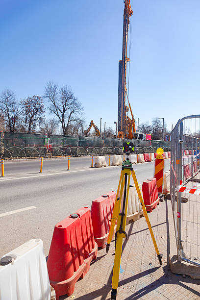 istock An optical road level stands on a road undergoing repairs. 2208531821