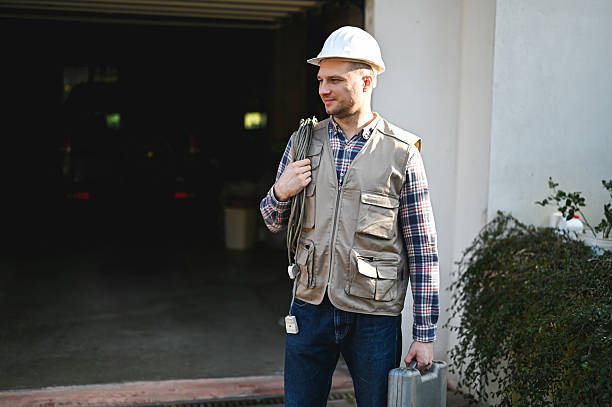 Electrician exiting garage