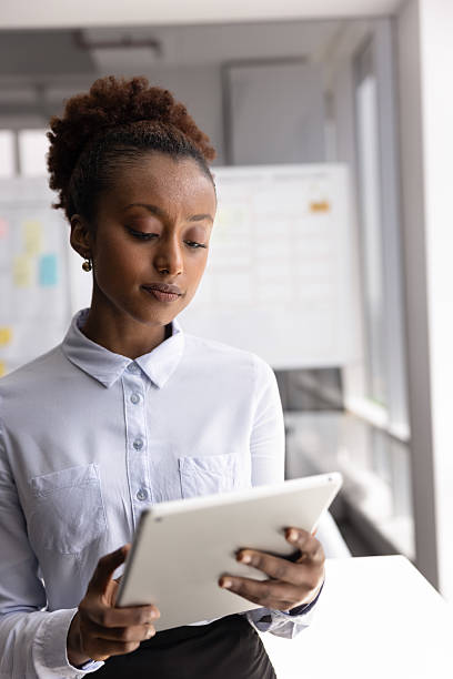istock Serious young African businesswoman working on Internet startup 2208534981