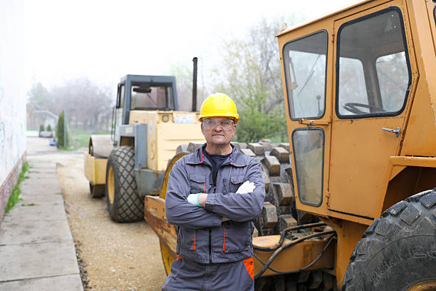 istock Middle-Aged Male Engineer with Yellow Helmet, Portrait 2208537033