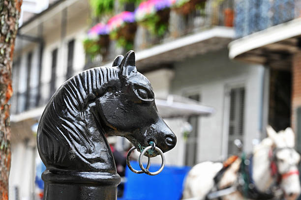 Horse head hitching post in the streets of the French Quarter, New Orleans