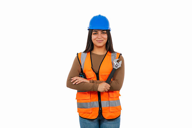 istock Confident Latina construction worker holding adjustable wrench 2208541294