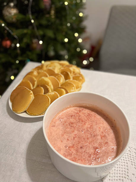 Indulge in Festive Treats Delightful Pancakes and a Refreshing Strawberry Smoothie