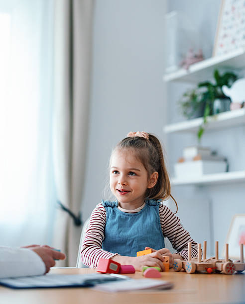 istock Young Girl at a Pediatrician's Office in a Calm Setting 2208547168