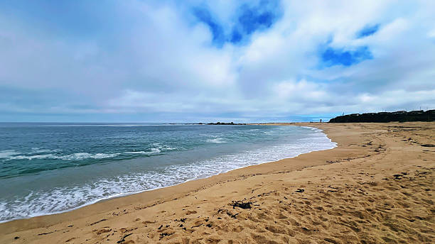 istock Beach with golden sand and crystal-clear water 2208547286