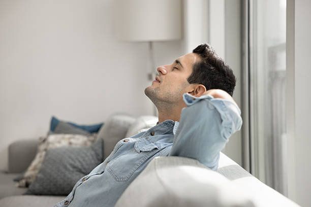 istock Happy peaceful young Hispanic man enjoying calm silent leisure time 2208547714
