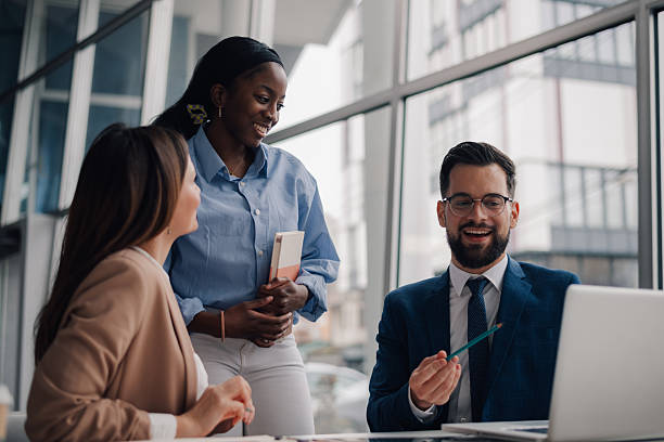 istock Business team discussing strategy during meeting in modern office 2208547843